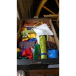 A Box Containing Colourful Buddhist Prayer Flags, Panels and Fabrics