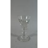 A 19th Century Toastmaster's Illusion Glass with Knopped Stem.