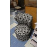 A Modern Bedroom Circular Upholstered Box Seat Chair