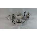 A Collection of Three Silver Plated Teapots and a Cake Basket