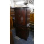 A Mahogany Bow Fronted Drinks Cabinet with Shelved Top Section, Pull Out Slide, Centre Drawer and
