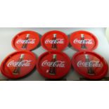 A Collection of Six Metal Coca Cola Advertising Trays, 32.5cm Diameter