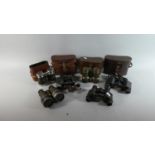 A Collection of Six Pairs of Vintage Binoculars