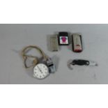A Collection of Curios to Include Nickle Cased Stopwatch (AF), Two Cigarette Lights, Pen Knife and