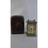 An Edwardian Silver Plated Travel Clock in Original Case, Missing Front and Side Glass Panel,