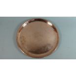 A Circular Copper Tray with Engraved Foliate Decoration, Monogrammed for Hugh Wallis, 28cm Diameter