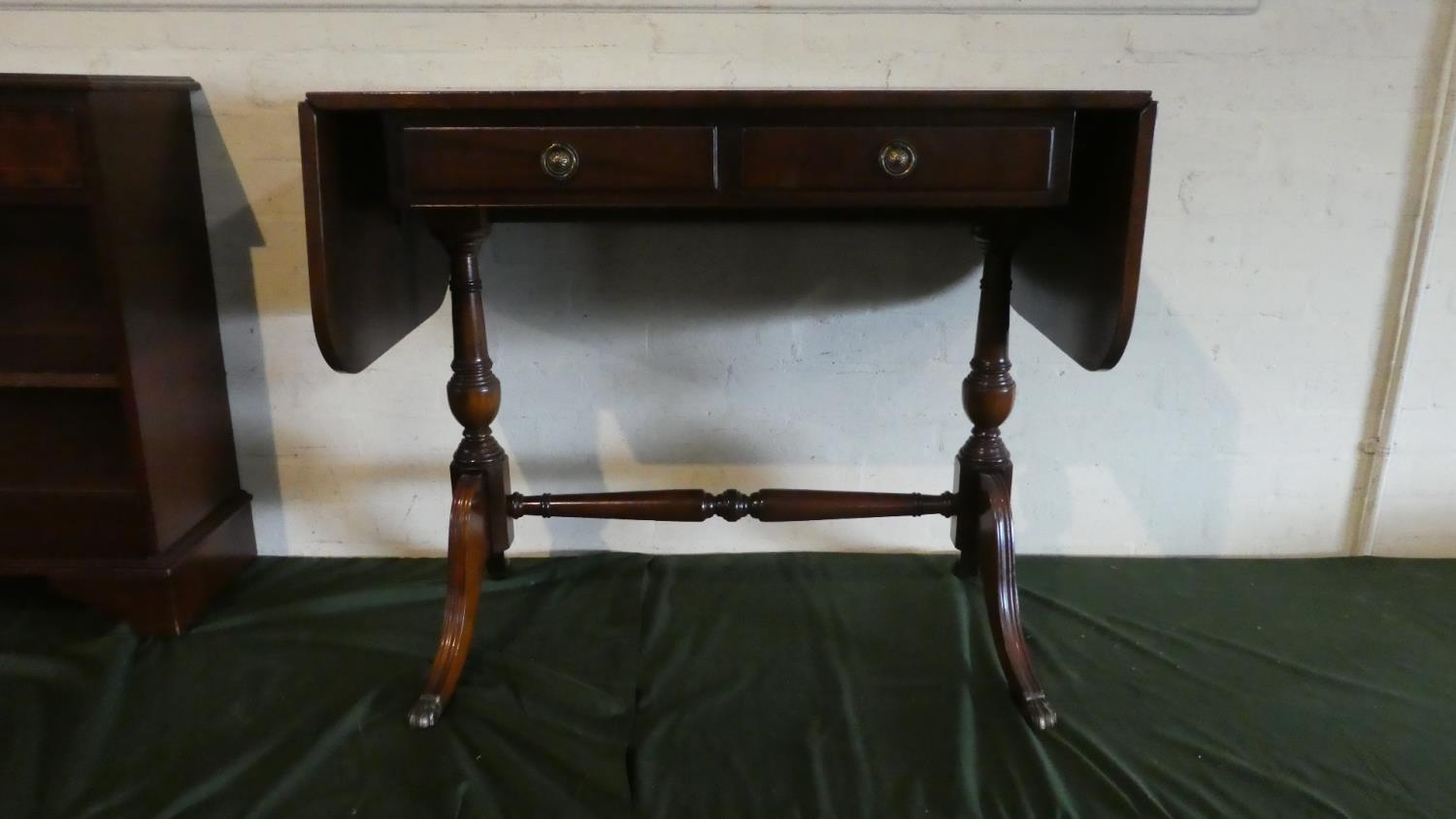 A Reproduction Mahogany Drop Leaf Two Drawer Sofa Table, (84cm Wide When Close)