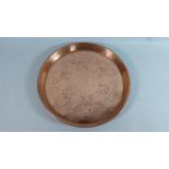 An Art Nouveau Circular Copper Tray with Foliate Decoration in Relife by J. S & S (Sankey), 31cm