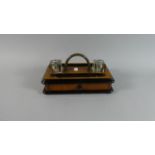 An Edwardian Ebonised Walnut Desk Top Inkstand with Long Drawer and Two Glass Inkwells, 25cm Wide