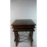 A Modern Nest of Three Mahogany Tables, 53cm Wide