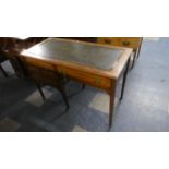 An Edwardian Tooled Leather Topped Writing Desk with One Long and Three Short Drawers, 106cm Wide