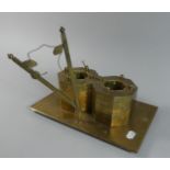 A Late 19th/Early 20th Century Brass Novelty Desk Stand in the Form of a Crane, the Rectangular Base