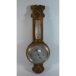 An Edwardian Oak Aneroid Wheel Barometer with Temperature Scale, 62cm High