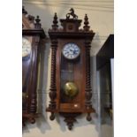 A Late Victorian/Edwardian Vienna Style Wall Clock with Half Spiral Plaster Decoration and Rearing