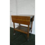 An Edwardian Oak Drop Leaf Two Tier Trolley, 61cm Wide