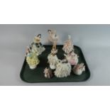 A Collection of Nine Continental Figural Ornaments of Dancing Girls Including Dresden
