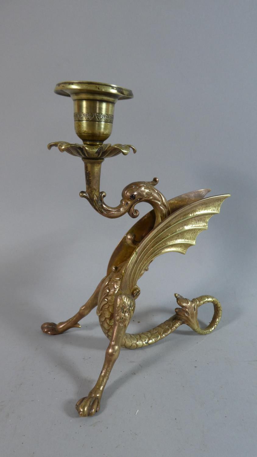 A Nice Quality Bronze Candle Stick in the Form of a Winged Dragon, 18.5cm High