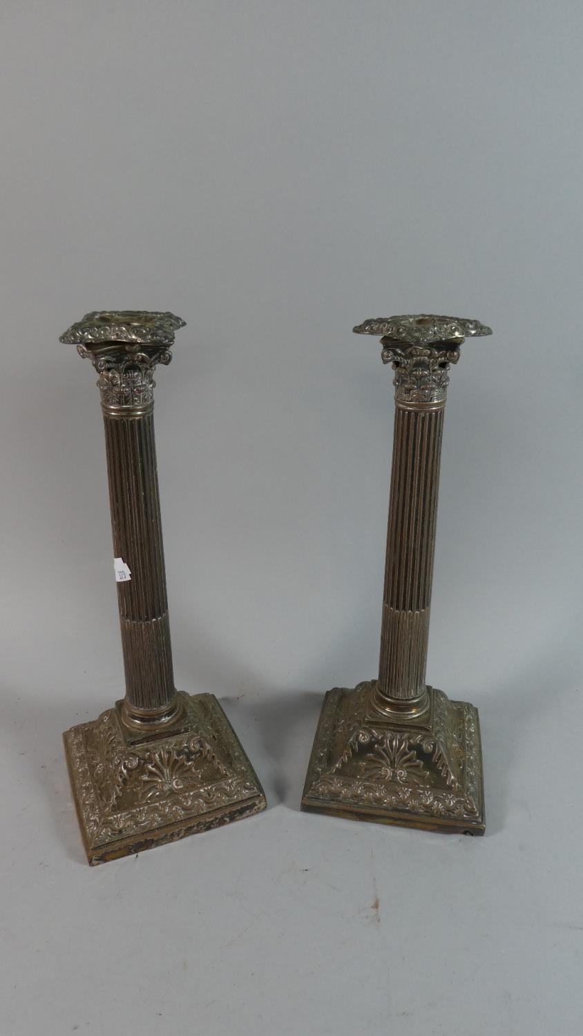 A Pair of Silver Plated Corinthian Column Candle Sticks on Stepped Square Bases, Each 31cm High