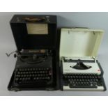 Two Portable Vintage Typewriters Including Olympia Traveller