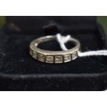A Ladies Dress Ring Stamped 375 with White Stones
