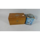 An Edwardian Oak Two Division Tea Caddy and a Tea Tin