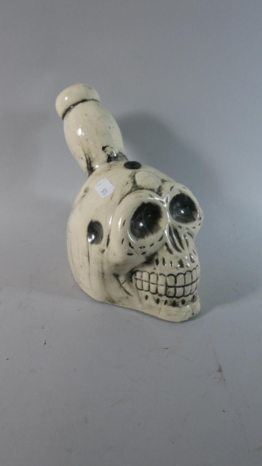 A Novelty Night Light in the form of a Human Skull, 19cm High