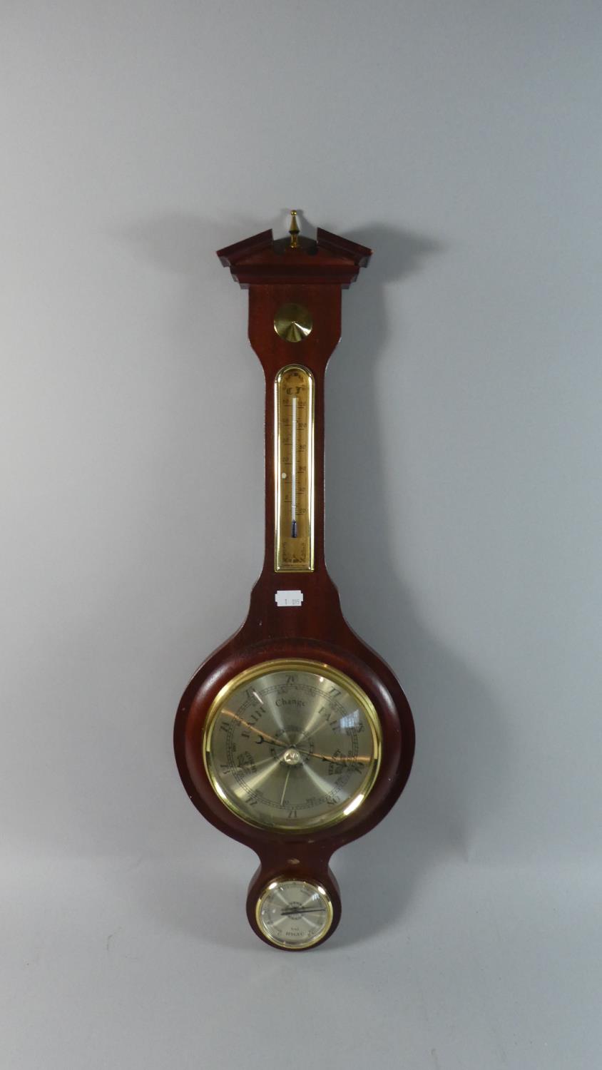 A Reproduction Mahogany Framed Wheel Barometer with Temperature Scale, 70cm high
