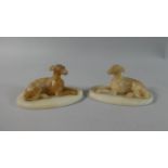 A Pair of 19th Carved Alabaster Studies of Reclining Greyhounds Set on Oval Plinth Bases (One Ear AF