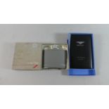 A Cased Concorde Hip Flask and a Bentley Motoring Notes Booklet