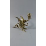 A Brass Novelty Candle Stick in the Form of a Winged Dragon, 18cm high