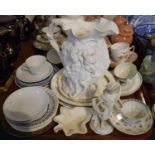 A Tray Containing Various Teacups and Saucers, Large Relief Decorated Jug, Creamware Figure and