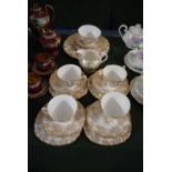 A Royal Vale Gilt Part Tea Set Comprising Four Trios, Cake Plate, Cream and Sugar, Two Side Plates