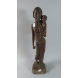 A Carved Ethnic Wooden Figure of Mother and Child on Plinth Base, Probably Indonesian, 50cm high