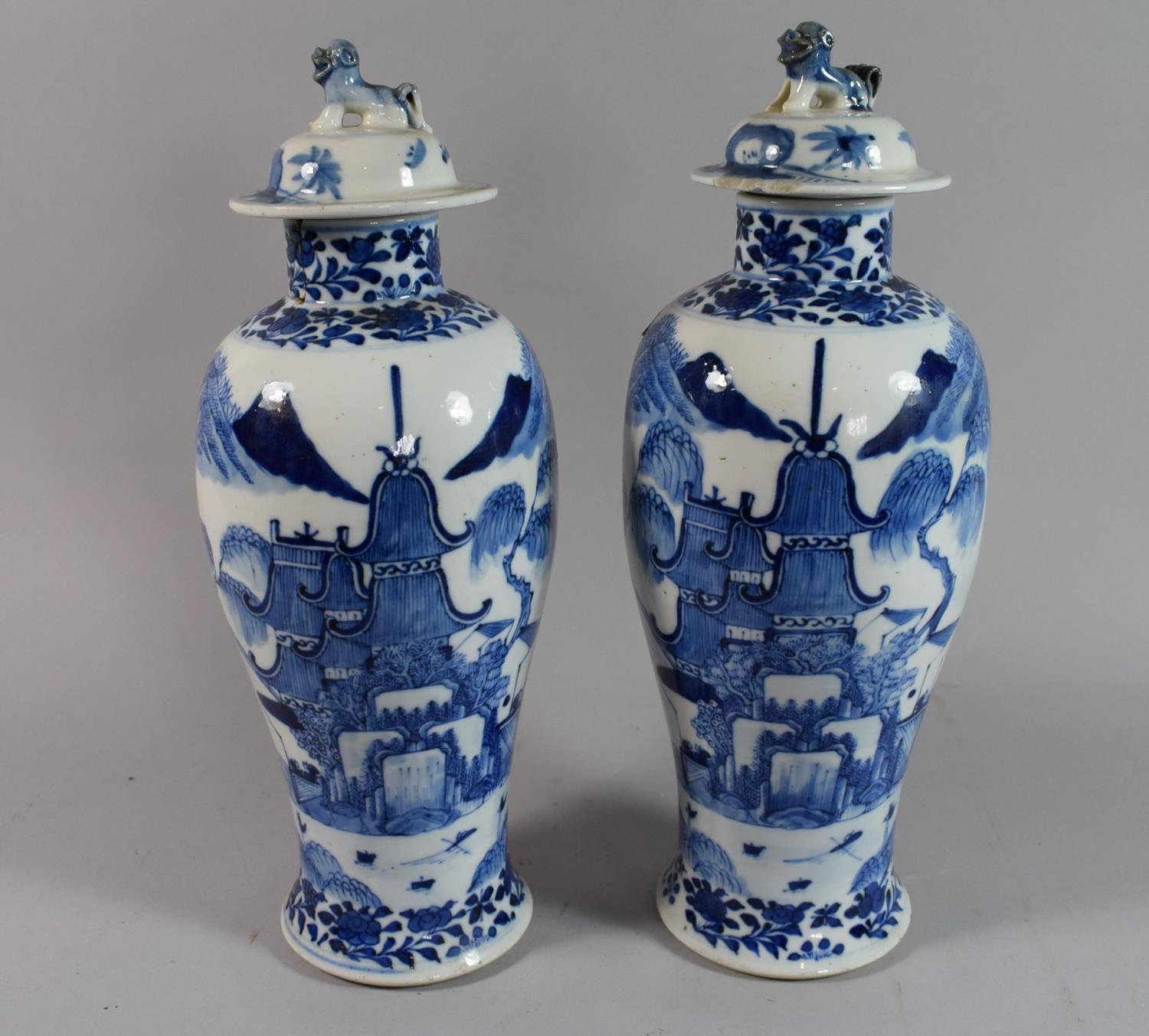 A Pair of Oriental Blue and White Lidded Vases, Neck AF and One Lid AF, 32cm High