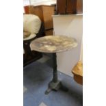 A Circular Topped Iron Based Tripod Garden Table, 50cm Wide