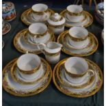 A Collection of French Porcelain Teawares to Include Six Trios, Sugar and Cream