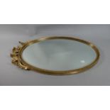 An Oval Gilt Framed Wall Mirror, 64cm high