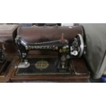 An Oak Cased Singer Sewing Machine