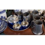 A Collection of Pewter Tankards, Three Piece Tea Set and a Tray
