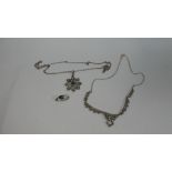 A Collection of Silver and White Metal Costume Jewellery to Include Necklace, Chain and Brooch