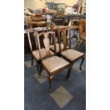 A Set of Four Edwardian Walnut Queen Anne Style Dining Chairs on Cabriole Front Legs