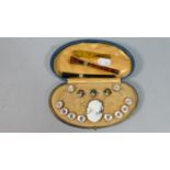 A Collection of Curious to Include Cheroot Holders, Gentleman's Dress Studs etc