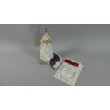 A Limited Edition Queen Elizabeth II Figure with Certificate