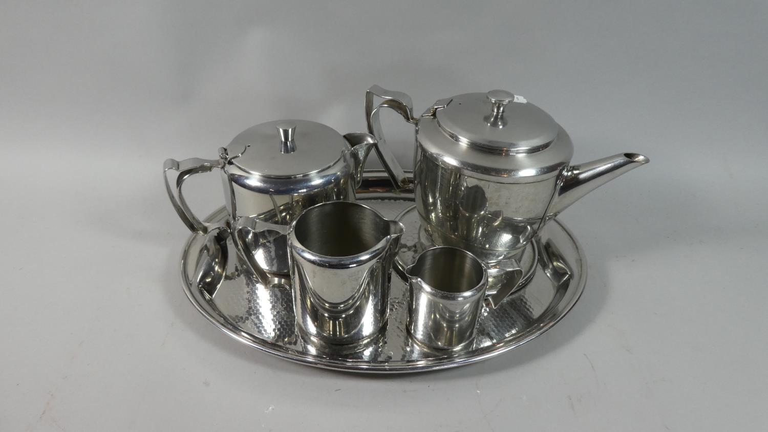 An Oval Silver Plated Tray Together with Old Hall Stainless Teawares