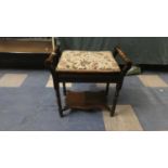 An Edwardian Oak Framed Lift Top Tapestry Seated Piano Stool