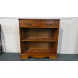 A Crossbanded Yew Wood Two Shelved Bookcase with Two Top Drawers, 78cm Wide