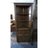 A Mid 20th Century Oak Double Freestanding Corner Cabinet with Two Shelved to Top Section and