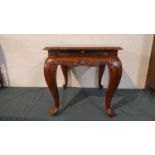 A Reproduction Rectangular Mahogany Coffee Table with Pull Out Slide and Extended Cabriole Legs with