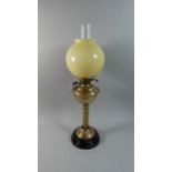 A Late Victorian Brass Oil Lamp with Opaque Glass Shade and Clear Glass Chimney, 65cm high