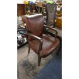 An Edwardian Hide Upholstered Desk Armchair, One Arm Requiring Attention